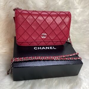 CHANEL
Red Stitch Leather CC WOC Clutch Bag